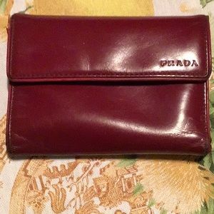 Vintage Prada Burgundy Leather Tri-Fold Wallet.